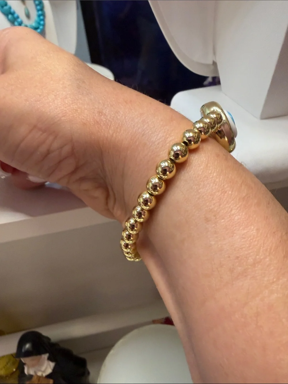 Gold Beaded Bracelet with Blue Evil Eye Charm